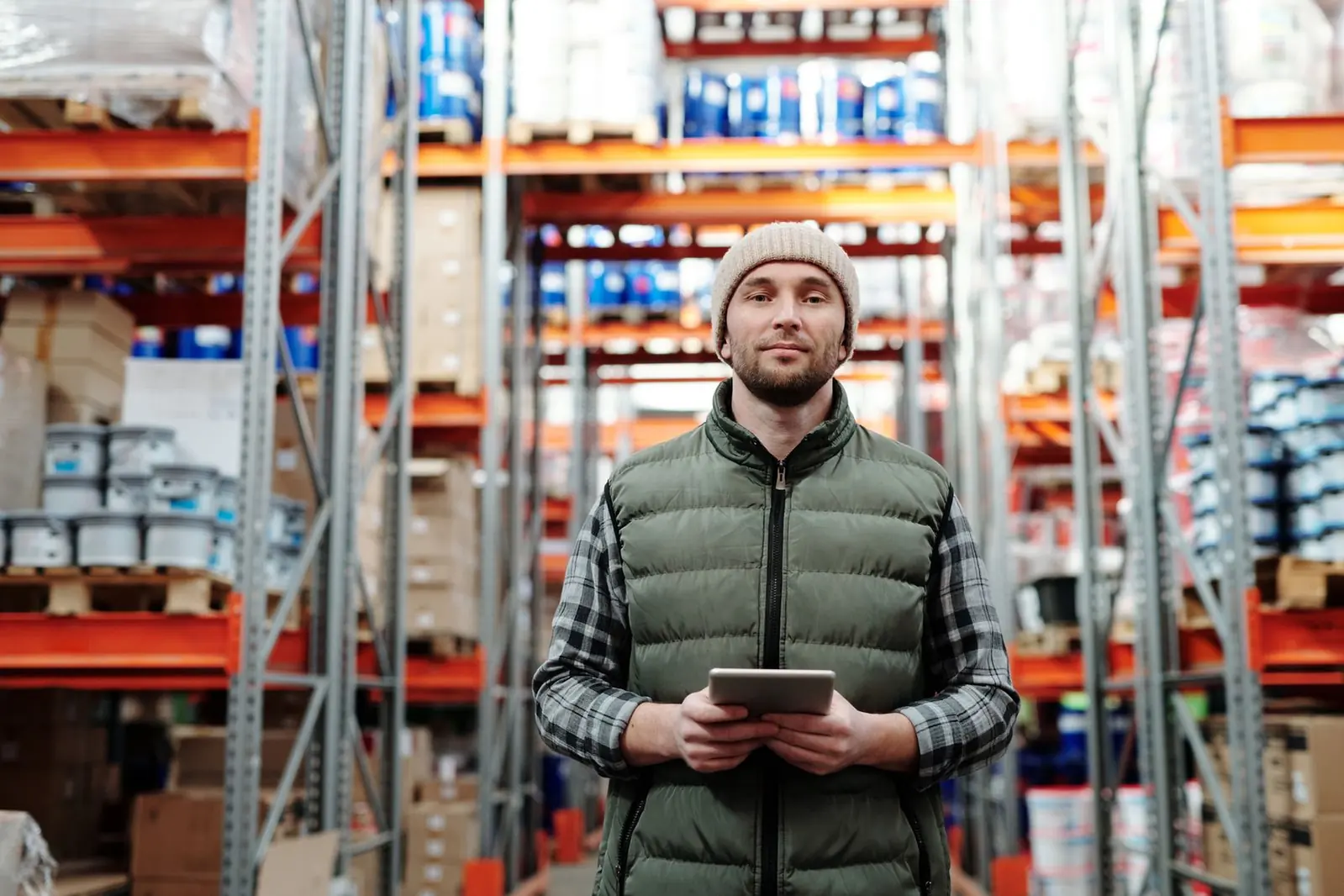 People working around freight in a logistics setting